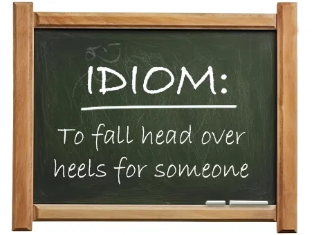 english idiom to fall head over heels for someone